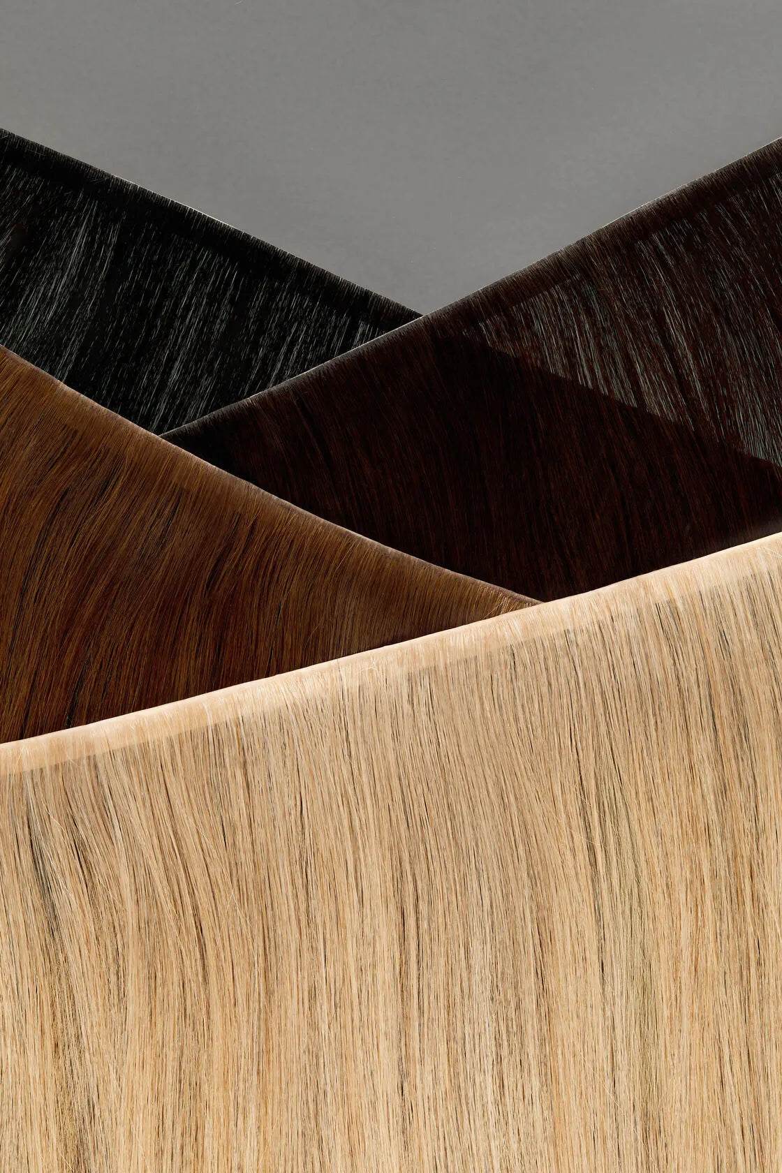 addendum hair revolutionary tape hair extensions come in 12 in weft panels that can be trimmed to size to for the most custom fit and application
